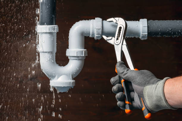 Professional Emergency Plumber technician working in Winsted, CT